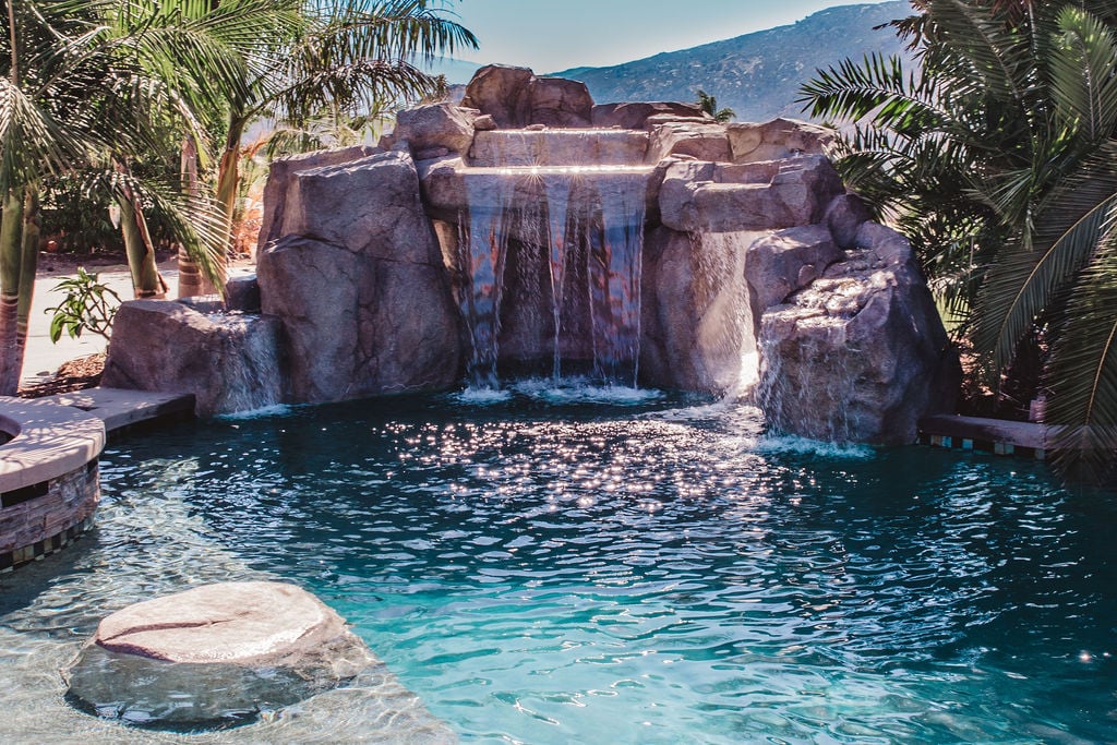 Complete pool remodel with rock waterfall feature by Sol Pacific in Carlsbad