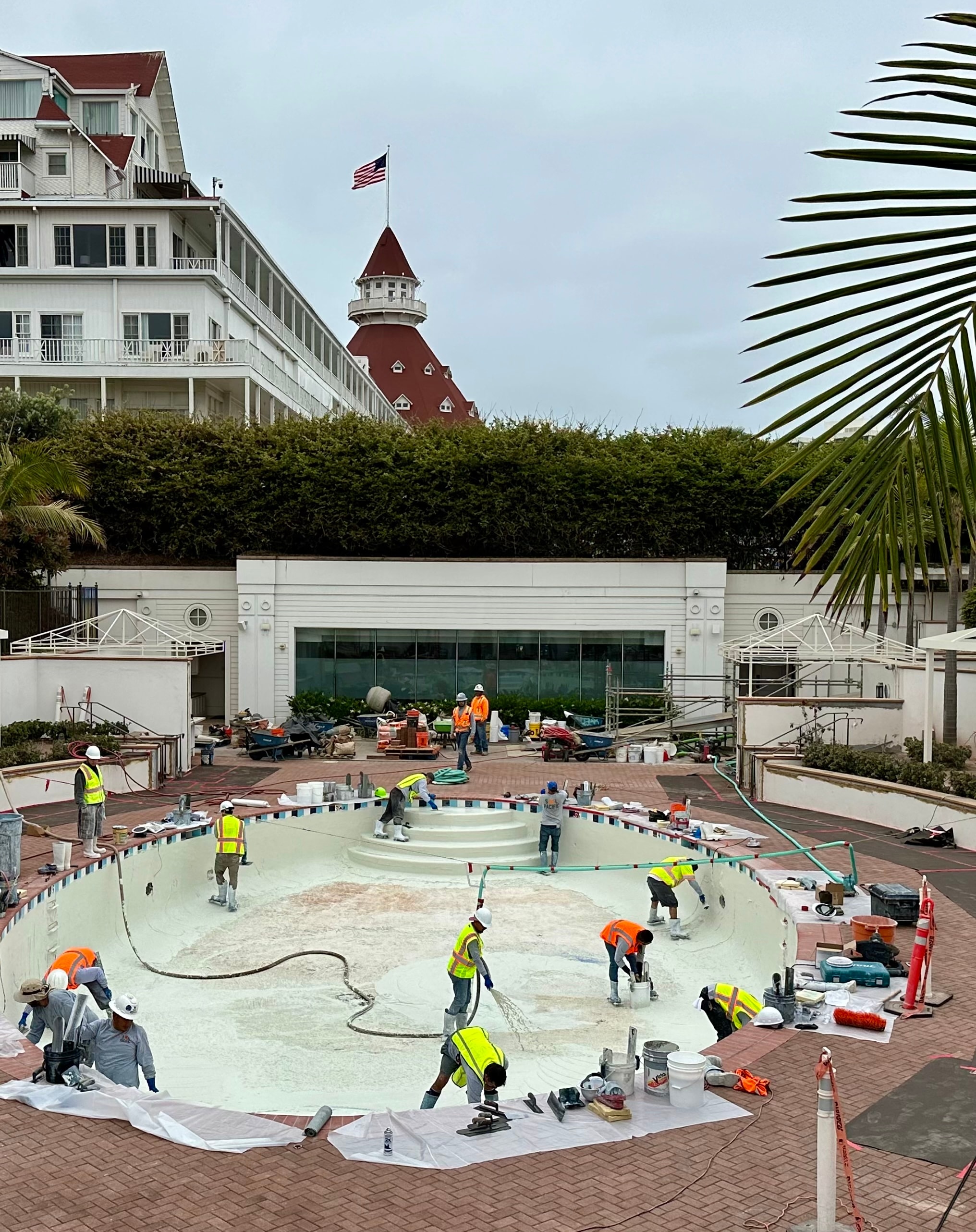 Sol Pacific Pool Plastering crew resurfacing a pool at Hotel del Coronado in San Diego